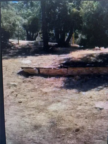 a view of yard covered with snow
