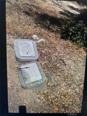 a view of a fireplace with wooden floor