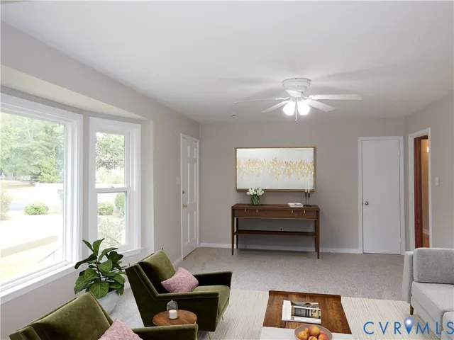 a living room with furniture and window