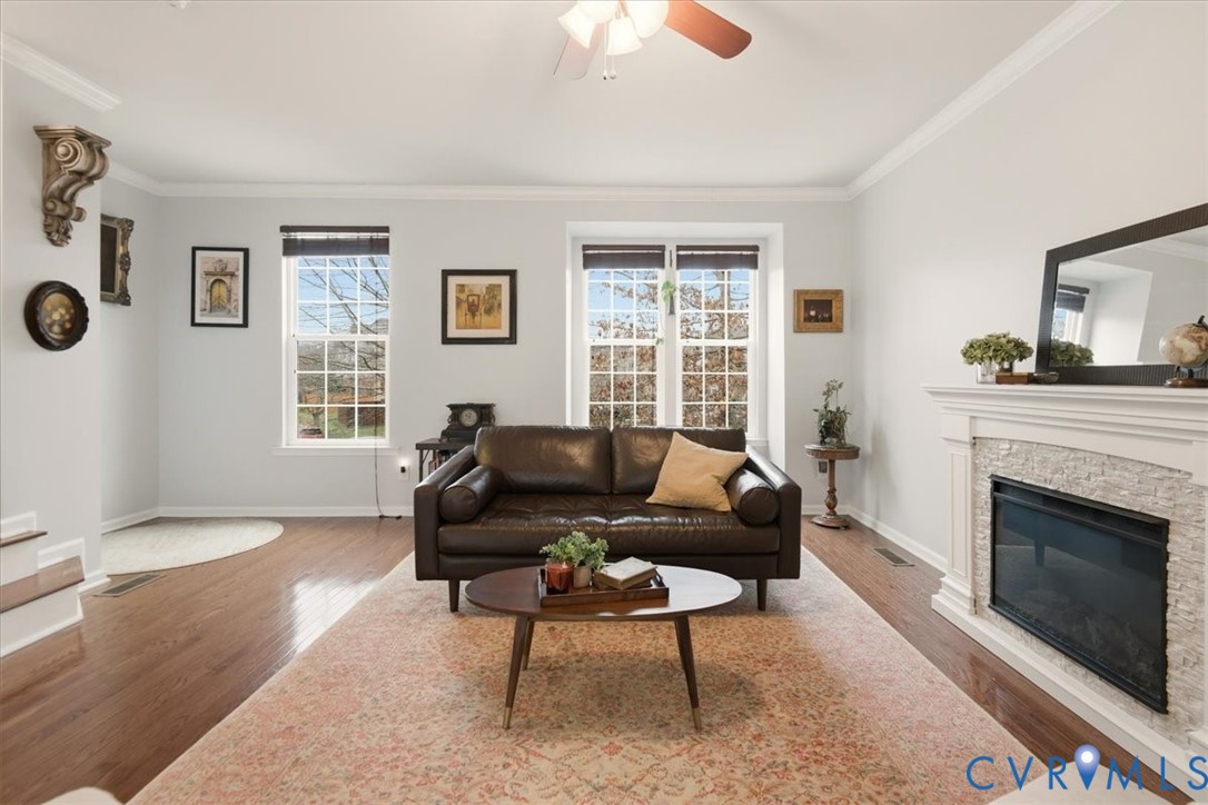 4836 Skyline Ridge Drive Midlothian, VA 23112 - Photo 15 of 44 a living room with furniture and a fireplace