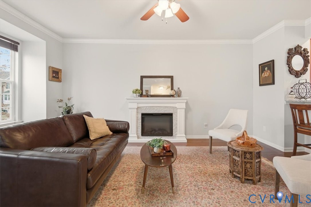 4836 Skyline Ridge Drive Midlothian, VA 23112 - Photo 17 of 44 a living room with furniture and a fireplace