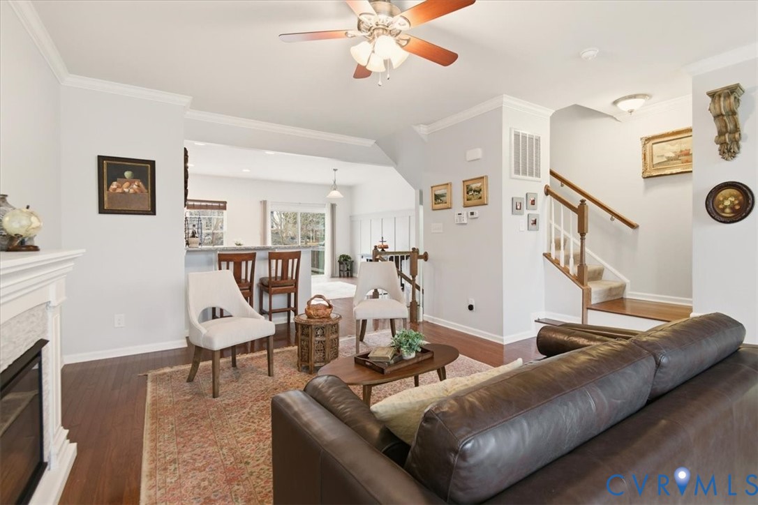 4836 Skyline Ridge Drive Midlothian, VA 23112 - Photo 19 of 44 a living room with furniture and a fireplace