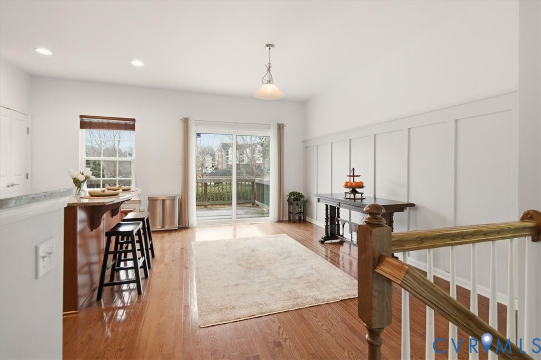 4836 Skyline Ridge Drive Midlothian, VA 23112 - Photo 2 of 44 a living room with furniture a flat screen tv and a large window