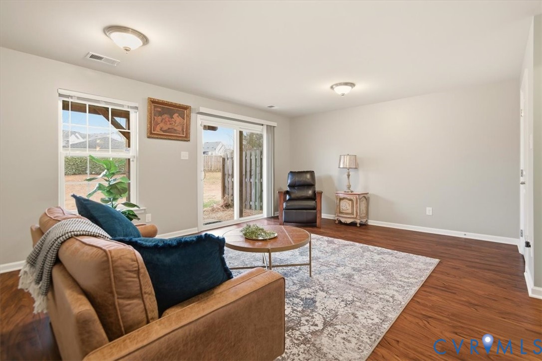 4836 Skyline Ridge Drive Midlothian, VA 23112 - Photo 28 of 44 a living room with furniture and wooden floor