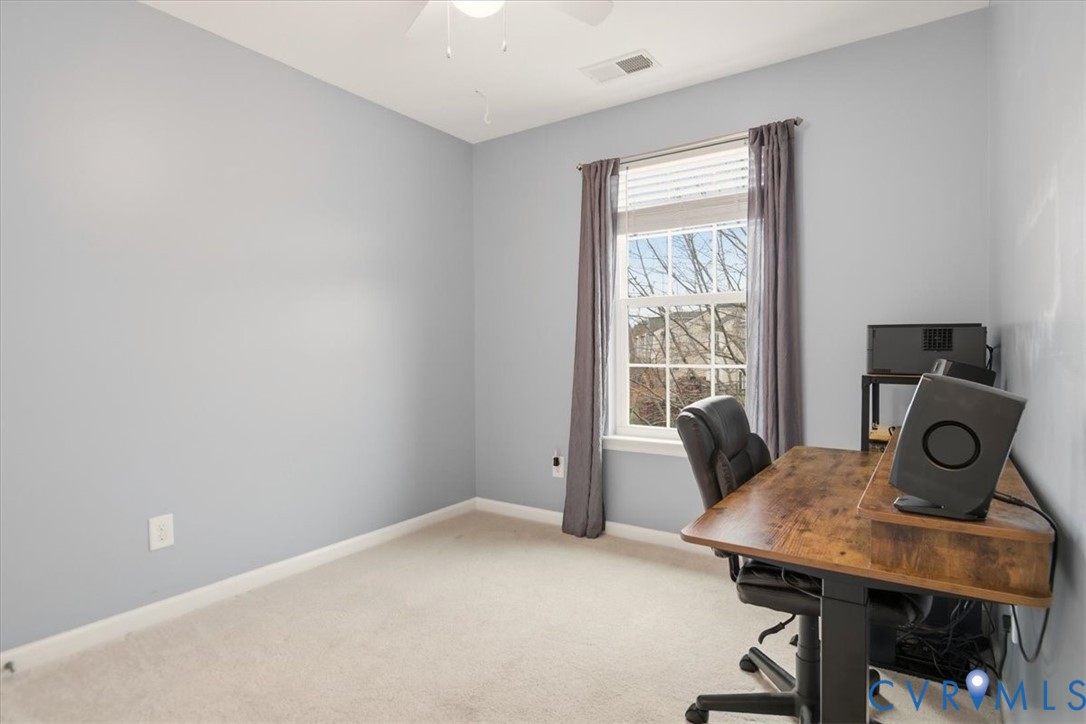 4836 Skyline Ridge Drive Midlothian, VA 23112 - Photo 29 of 44 a view of a workspace with furniture and window