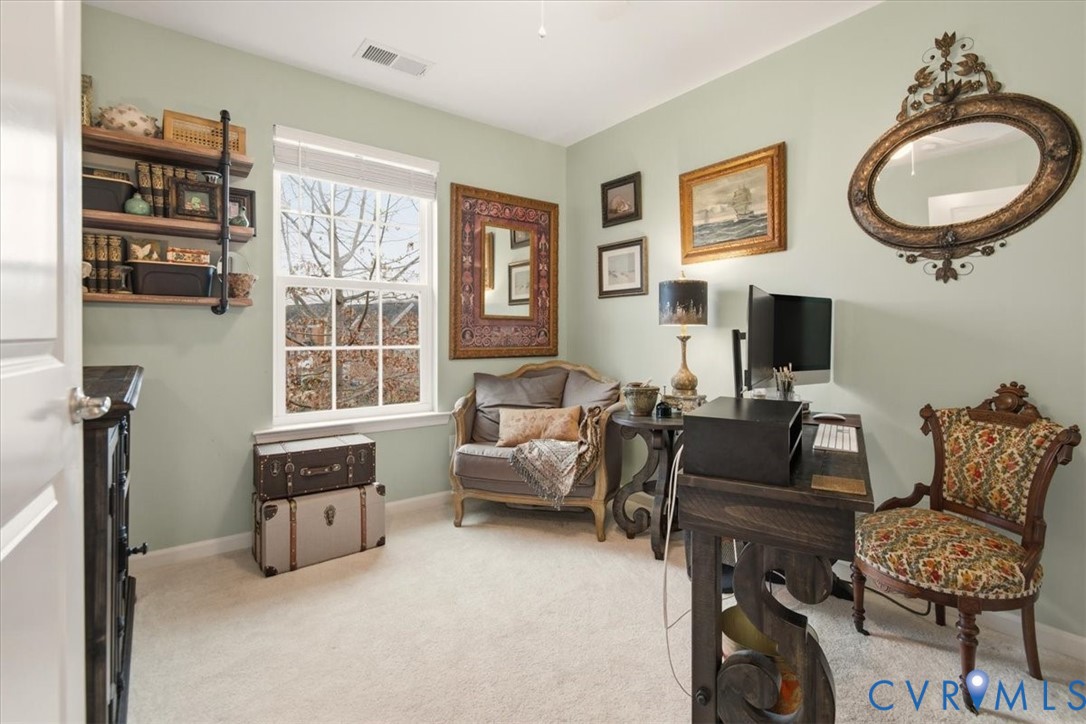 4836 Skyline Ridge Drive Midlothian, VA 23112 - Photo 34 of 44 a living room with furniture and a flat screen tv