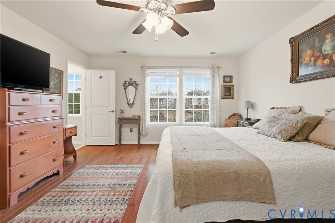 4836 Skyline Ridge Drive Midlothian, VA 23112 - Photo 37 of 44 a bedroom with a bed and a flat screen tv