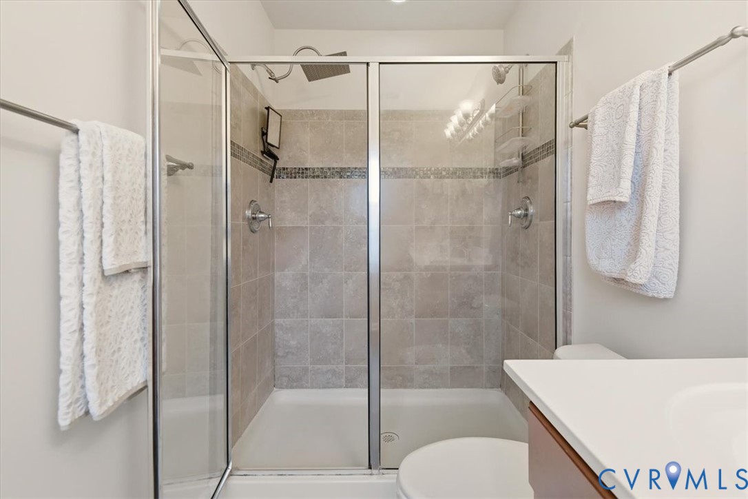 4836 Skyline Ridge Drive Midlothian, VA 23112 - Photo 40 of 44 a bathroom with a shower and a sink