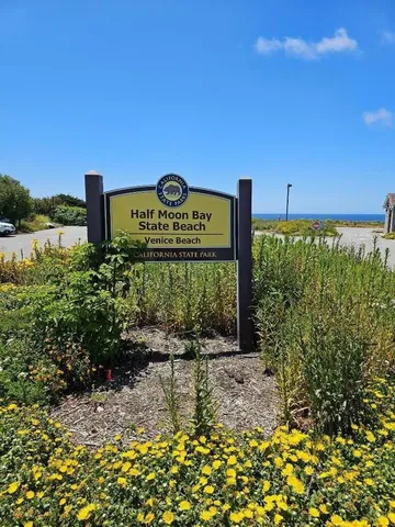 a view of a street with a building in the background