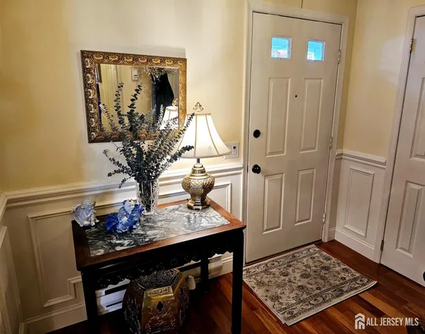 a view of kitchen with furniture and wooden floor