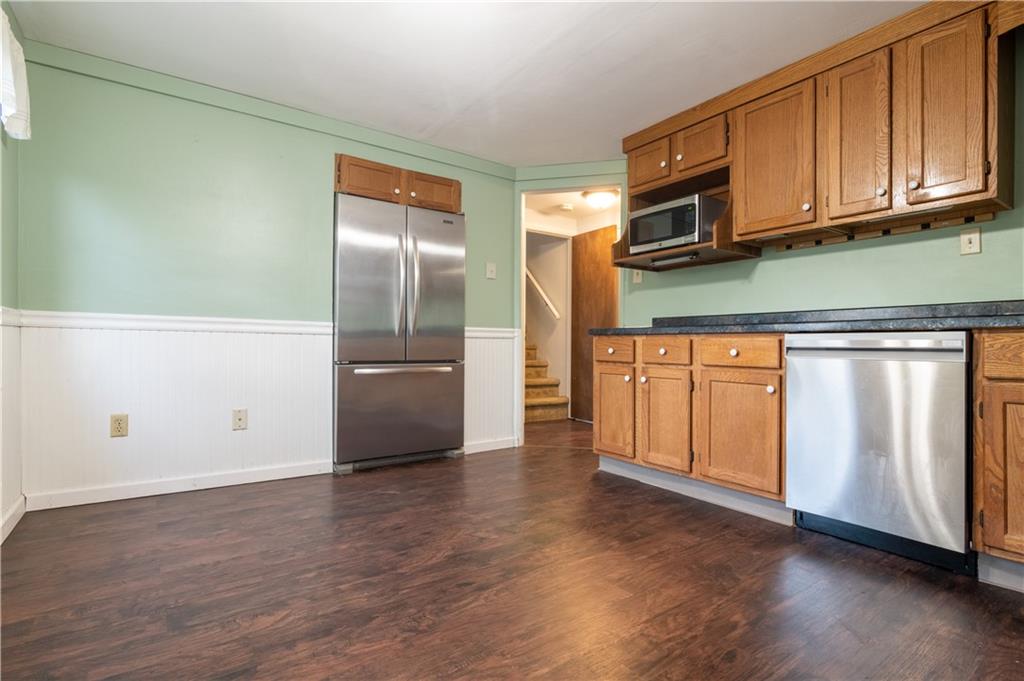 265 Chubbic Road Canonsburg, PA 15317 - Photo 11 of 22 a kitchen with stainless steel appliances granite countertop a refrigerator and a stove top oven