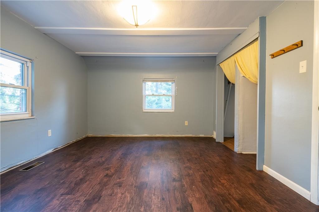 265 Chubbic Road Canonsburg, PA 15317 - Photo 15 of 22 an empty room with wooden floor and windows