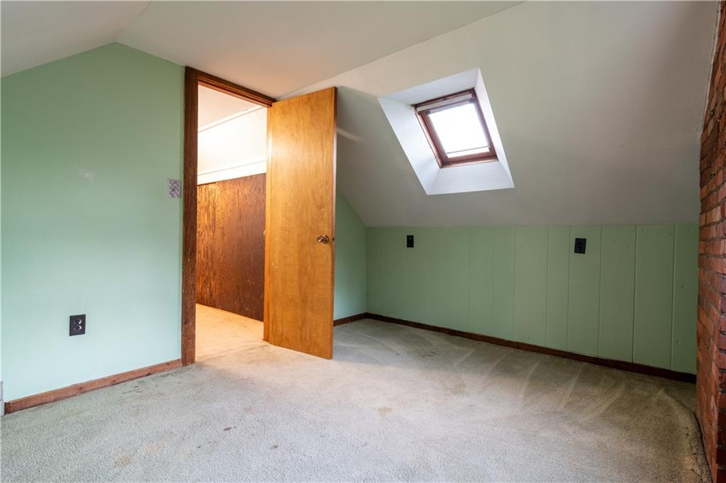 265 Chubbic Road Canonsburg, PA 15317 - Photo 17 of 22 an empty room with a window and a ceiling fan