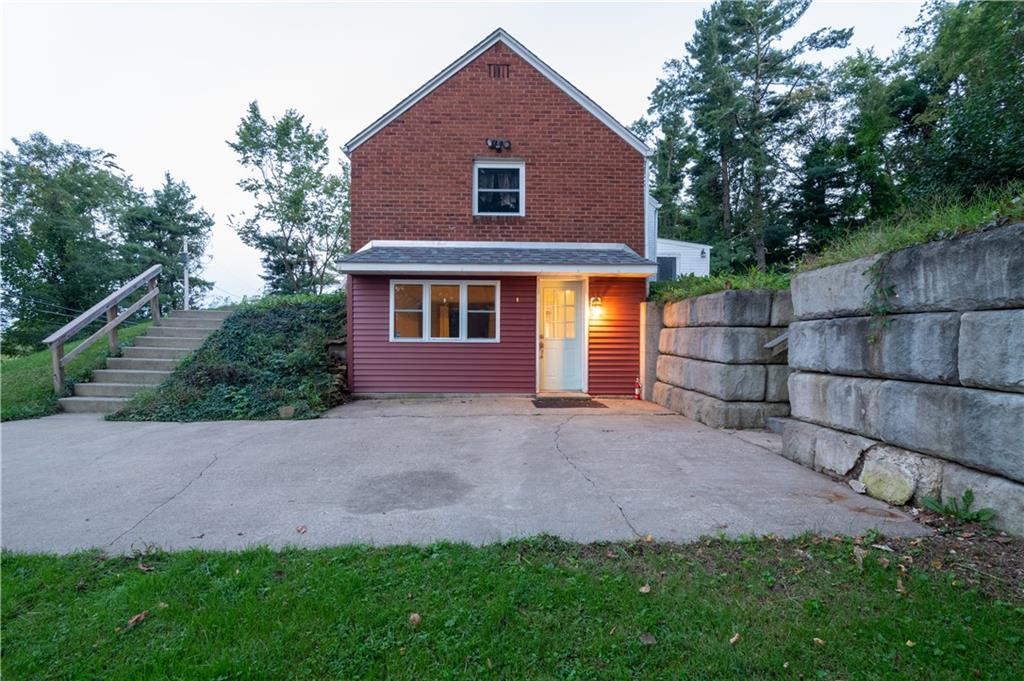 265 Chubbic Road Canonsburg, PA 15317 - Photo 2 of 22 a front view of a house with a yard