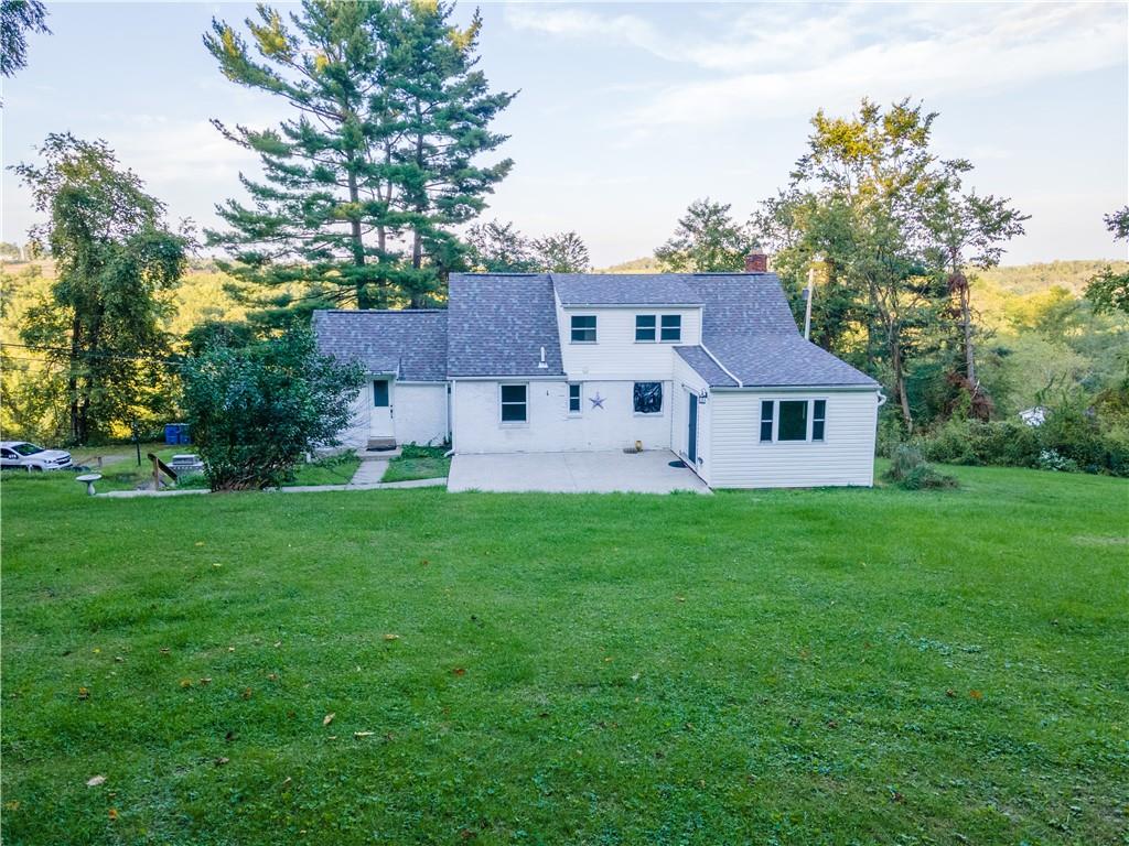 265 Chubbic Road Canonsburg, PA 15317 - Photo 5 of 22 a view of a house with a big yard potted plants and large tree