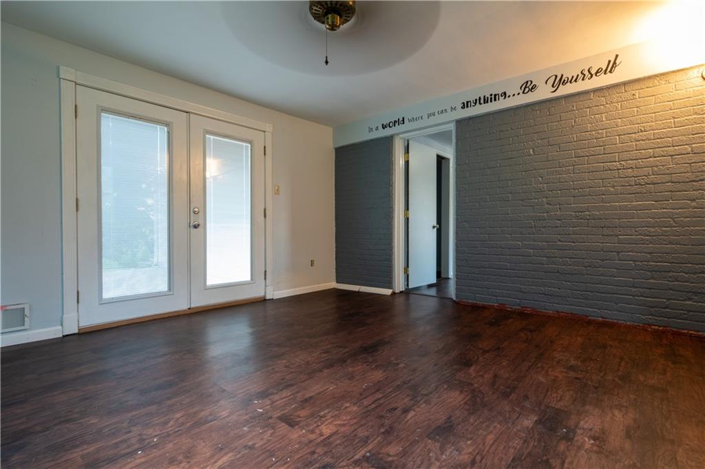 265 Chubbic Road Canonsburg, PA 15317 - Photo 9 of 22 a view of an empty room with wooden floor and a window