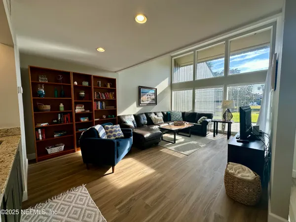 a table and chairs in front of a house