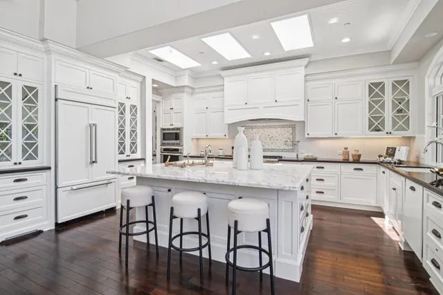 a bed room with furniture and wooden floor