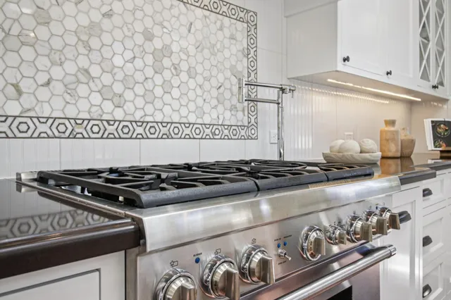 a bedroom with a bed and a fireplace