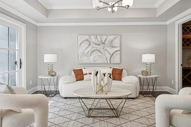 a bedroom with a bed and a potted plant
