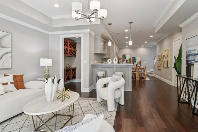 a bathroom with a granite countertop sink a toilet and a mirror