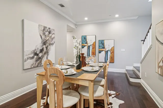 a view of a patio with couches chairs and potted plants