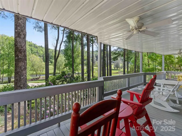 a view of a chair and table in the balcony