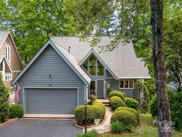 front view of house with outdoor seating