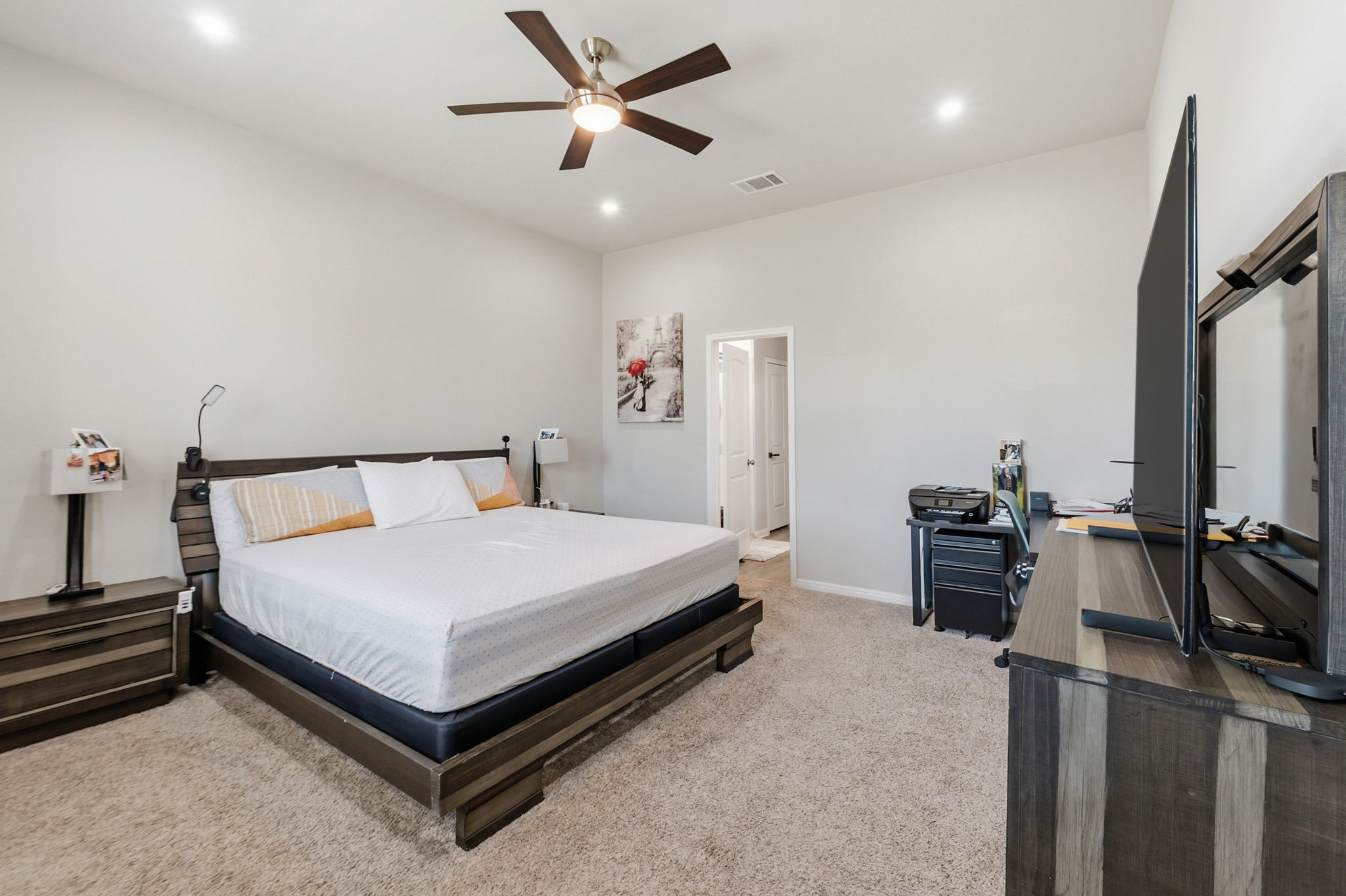 142 Brunnen Way Georgetown, TX 78626 - Photo 11 of 22 A quiet retreat, this bedroom offers ample space and plush carpet for comfort.