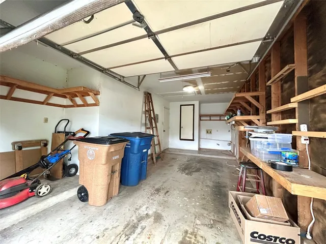 a view of empty room with wooden ceiling