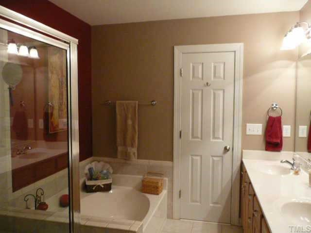 3812 April Place Raleigh, NC 27612 - Photo 8 of 12 Master Bath with garden tub and separate shower, walk in closet off master bath Other