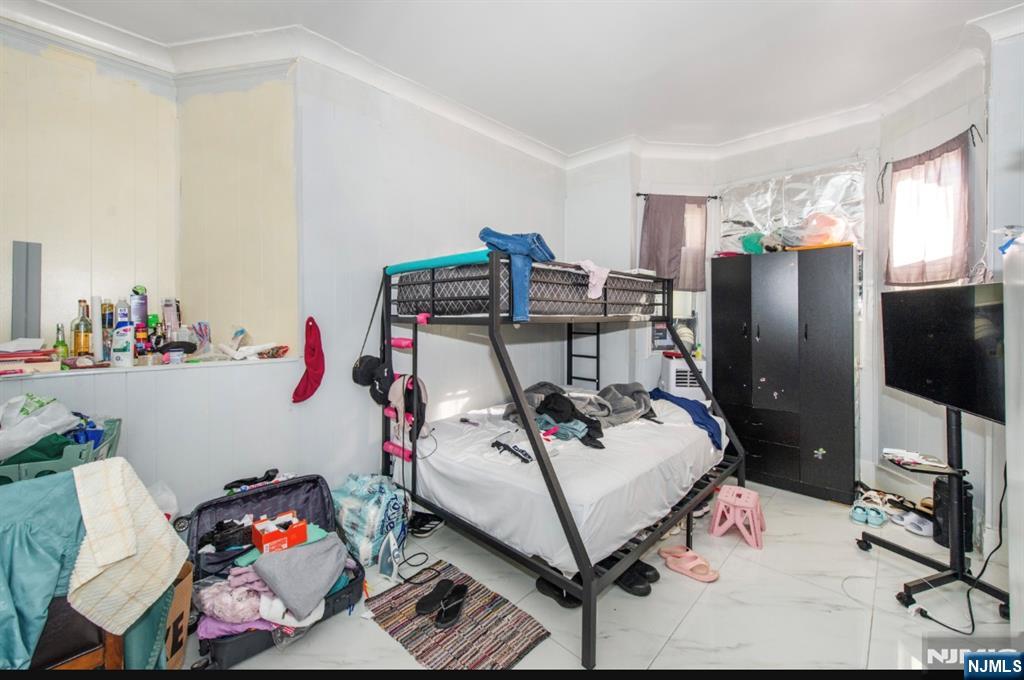 337-379 Ellison Street Paterson, NJ 07501 - Photo 15 of 27 a utility room with storage and utility