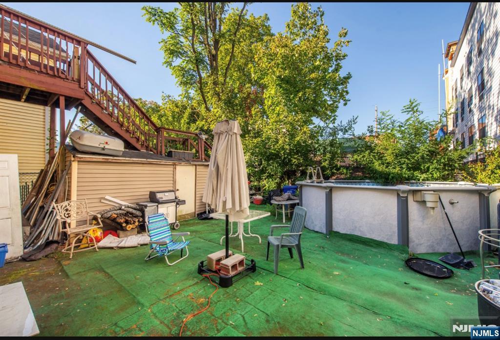 337-379 Ellison Street Paterson, NJ 07501 - Photo 25 of 27 a view of backyard with sitting area