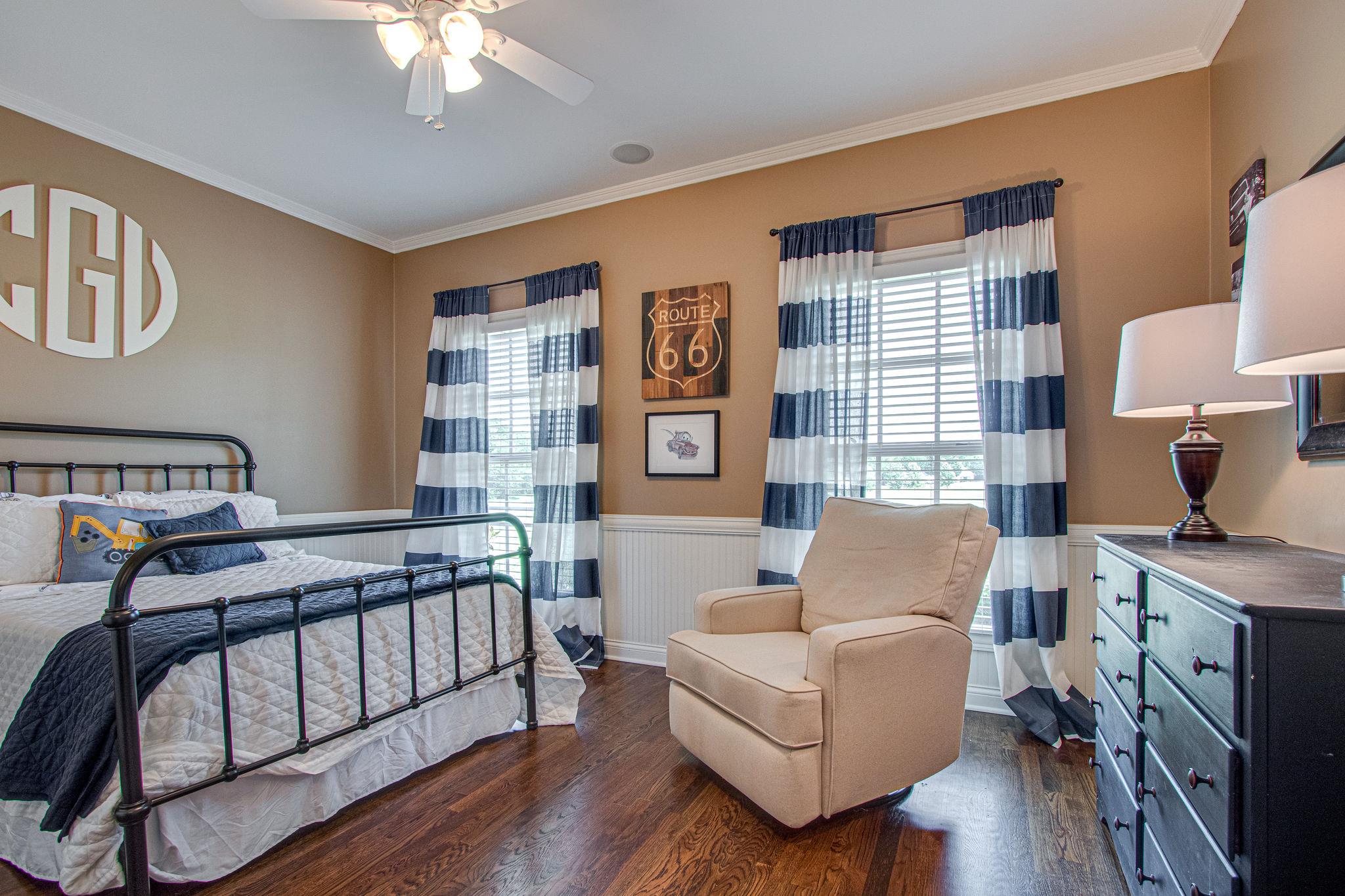 4996 Charles Dorris Road Springfield, TN 37172 - Photo 22 of 29 a living room with furniture and a fireplace