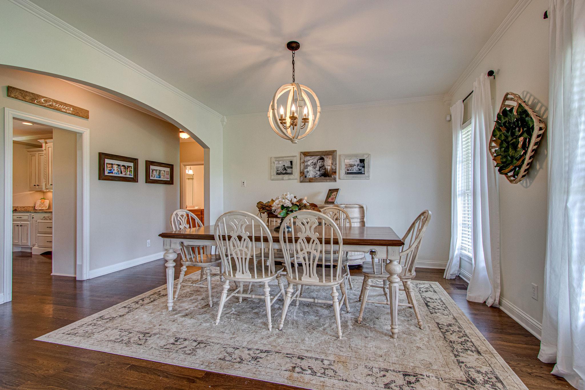 4996 Charles Dorris Road Springfield, TN 37172 - Photo 4 of 29 a view of a dining room with furniture window and wooden floor