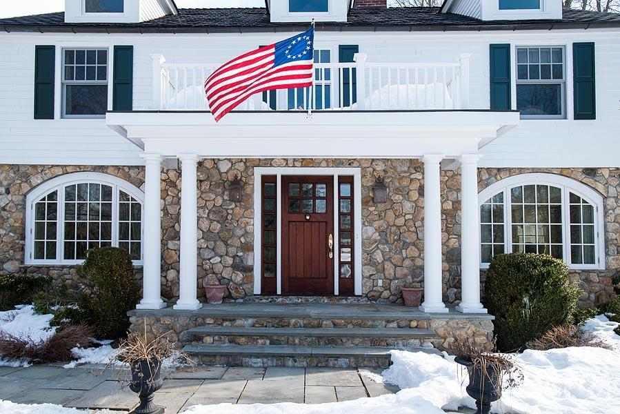 82 Parish Road New Canaan, CT 06840 - Photo 3 of 22 a front view of a house