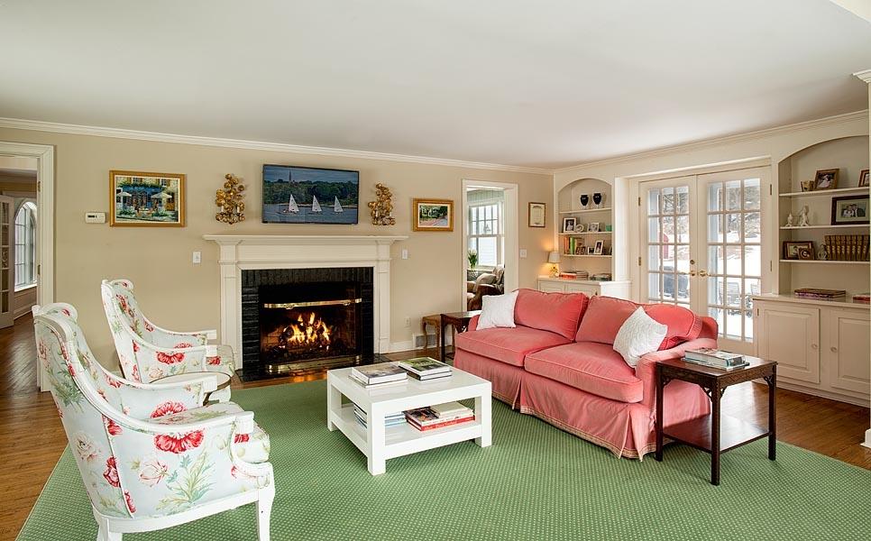 82 Parish Road New Canaan, CT 06840 - Photo 7 of 22 a living room with furniture and a fireplace