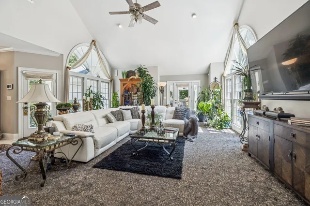 a kitchen with stainless steel appliances granite countertop a sink and cabinets