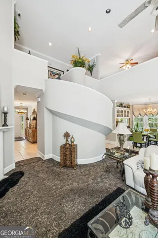 a kitchen with stainless steel appliances granite countertop a refrigerator and a stove