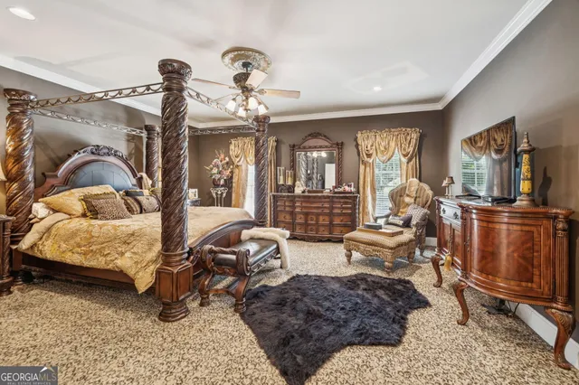 a bedroom with furniture and a window