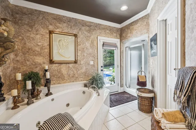 a kitchen with granite countertop white cabinets and sink