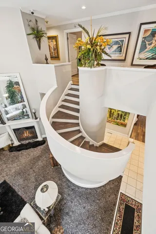 an aerial view of a houses with a yard