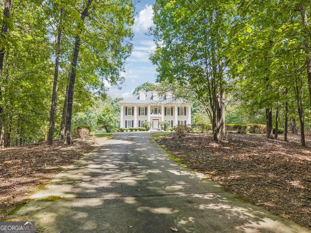 a view of a chair and table in the balcony