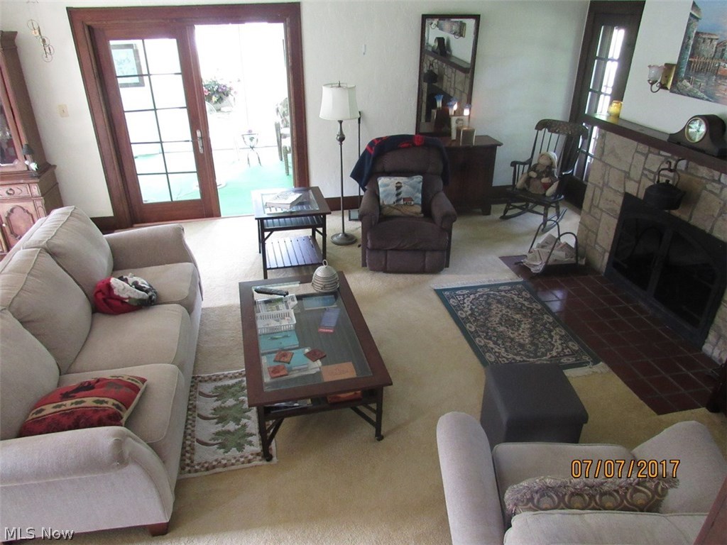 1664 Heather Road Madison, OH 44057 - Photo 5 of 32 Living room with access to front porch.