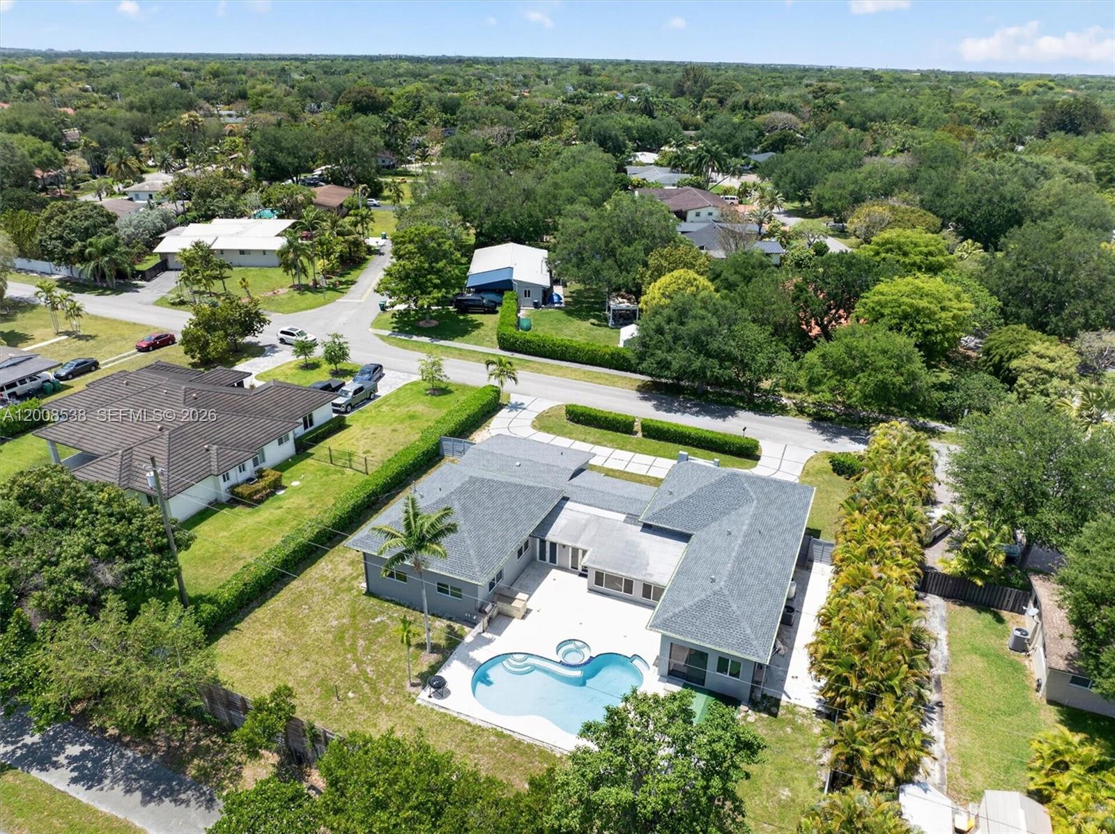 11811 Southwest 82nd Road Miami, FL 33156 - Photo 48 of 63 an aerial view of a house with a garden