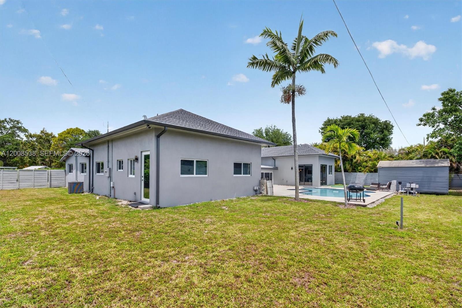 11811 Southwest 82nd Road Miami, FL 33156 - Photo 55 of 63 a house view with a outdoor space