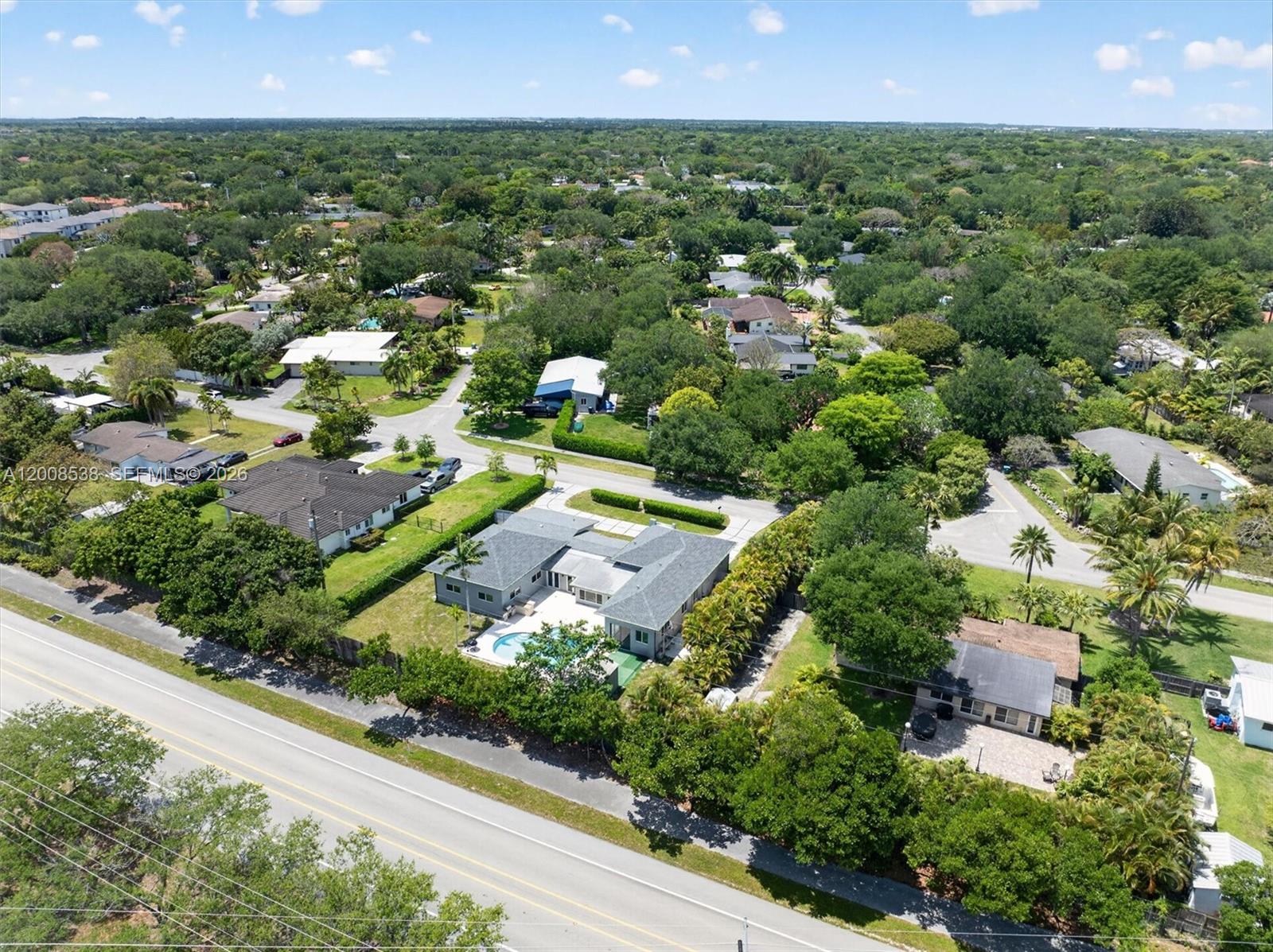 11811 Southwest 82nd Road Miami, FL 33156 - Photo 58 of 63 an aerial view of residential houses with outdoor space and street view