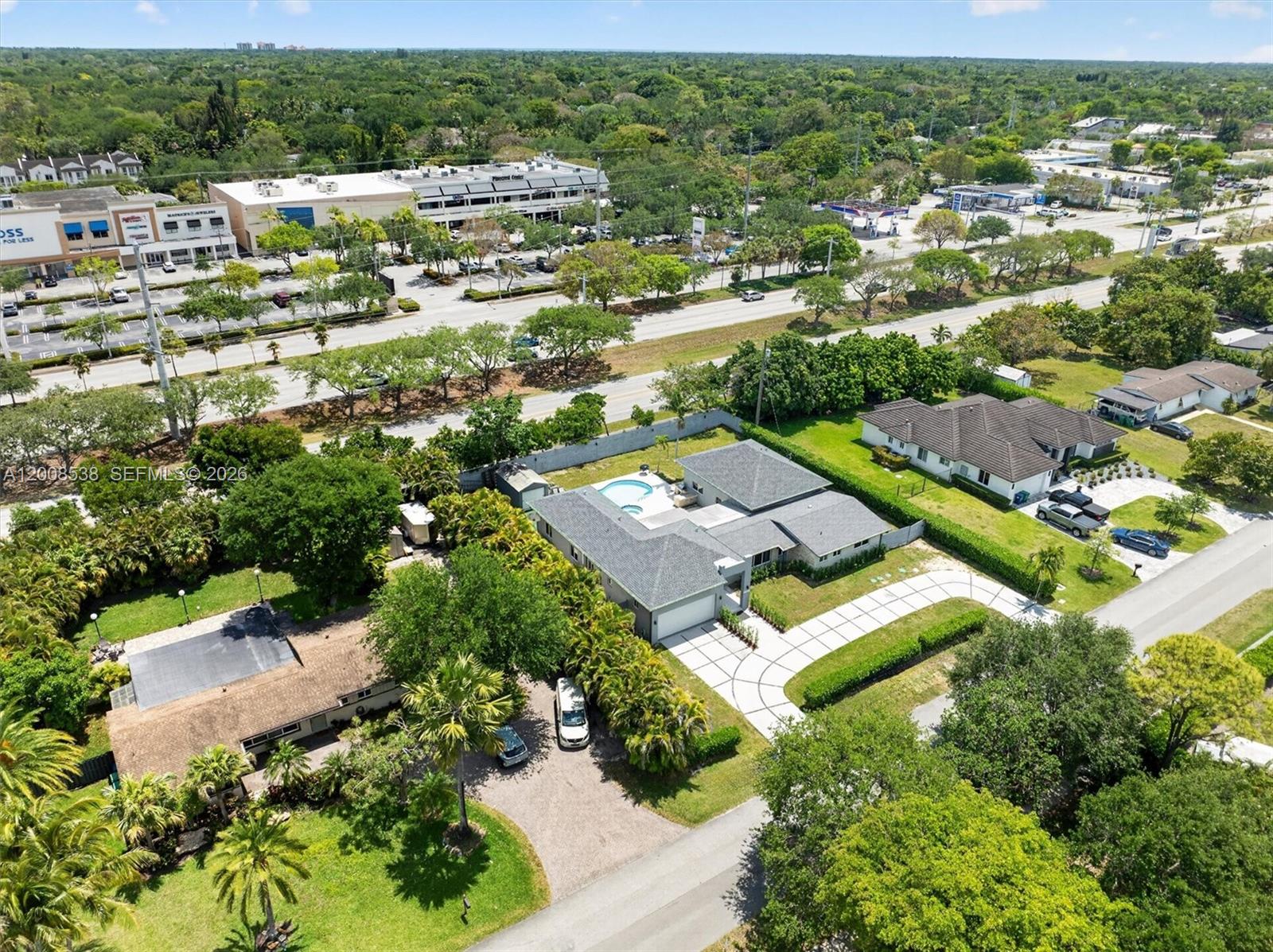 11811 Southwest 82nd Road Miami, FL 33156 - Photo 59 of 63 an aerial view of residential houses with outdoor space