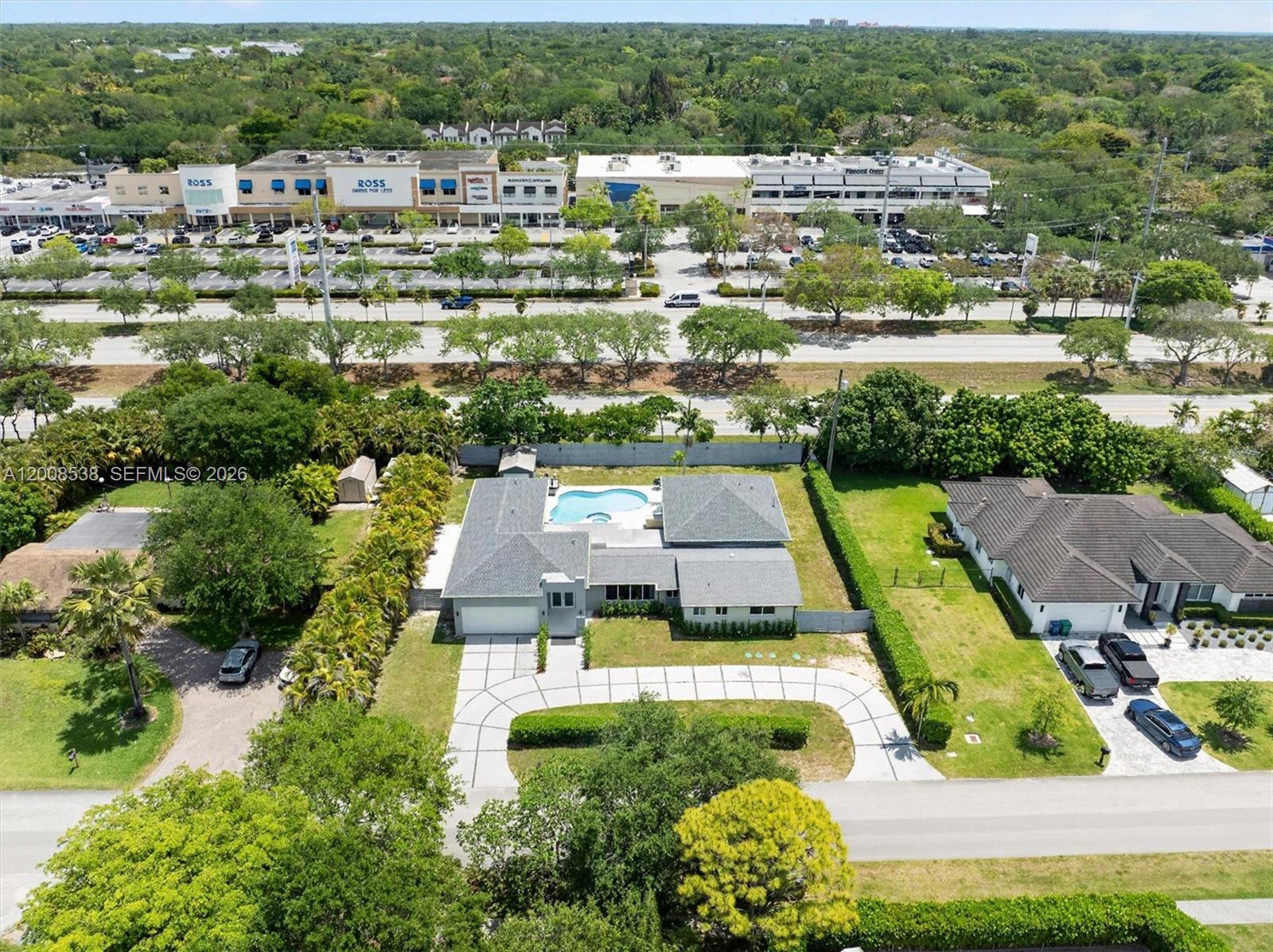 11811 Southwest 82nd Road Miami, FL 33156 - Photo 61 of 63 an aerial view of residential houses with outdoor space and river view