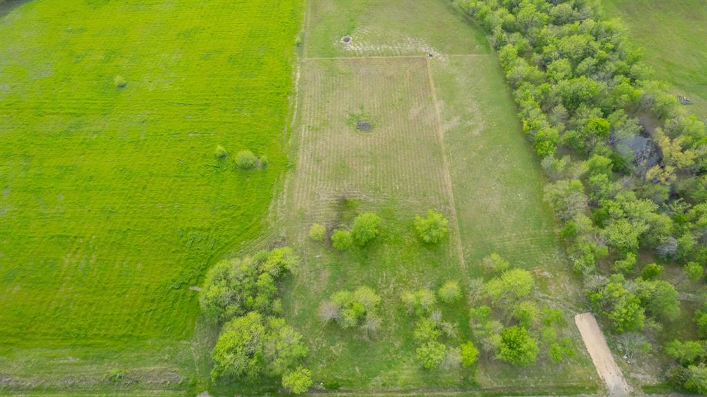 4804 County Road 4506 Commerce, TX 75428 - Photo 8 of 11 a bathroom with a shower yard